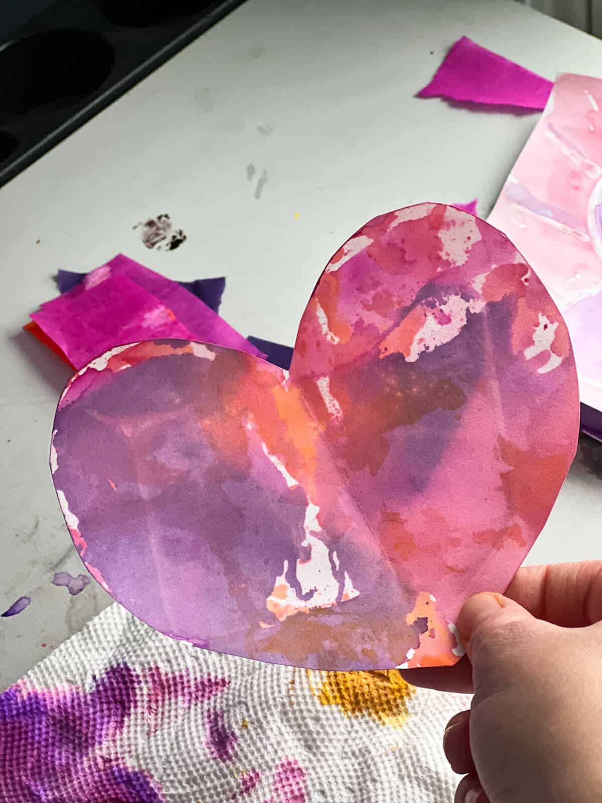 paper heart painted with bleeding tissue paper