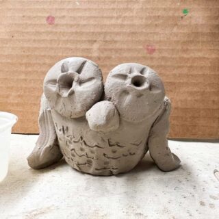 clay owl pinch pot art project for kids.