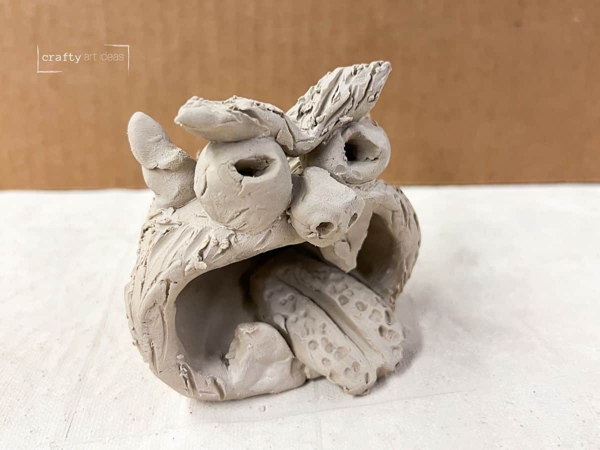 clay pinch pot monster project for kids.