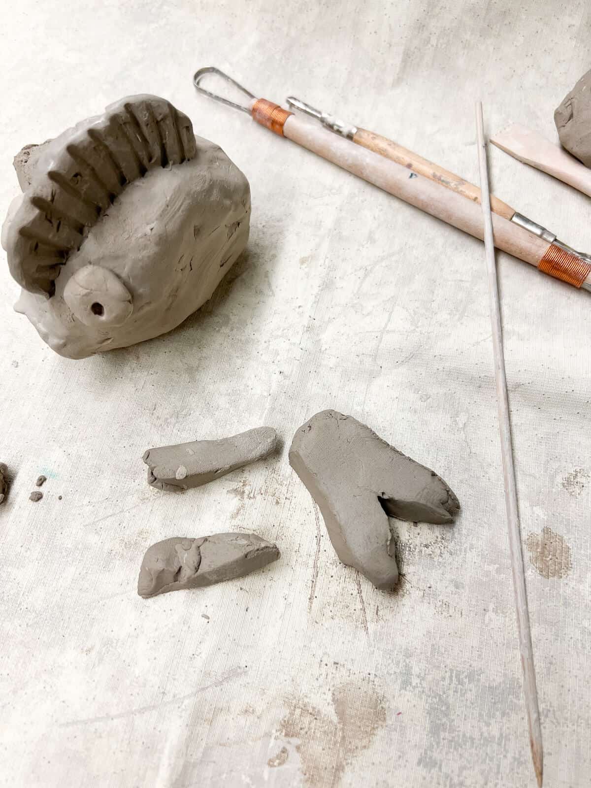 fish parts being made out of clay for kids art project. 