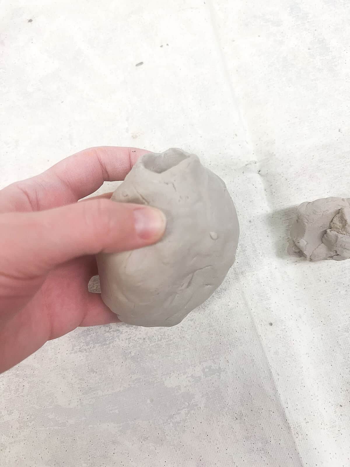 hollow clay form that will be used to create a clay fish art project.