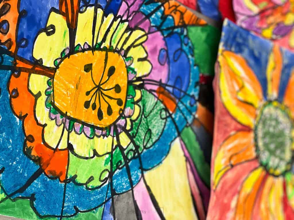 colorful large flower oil pastel and tempera paintings by kids.