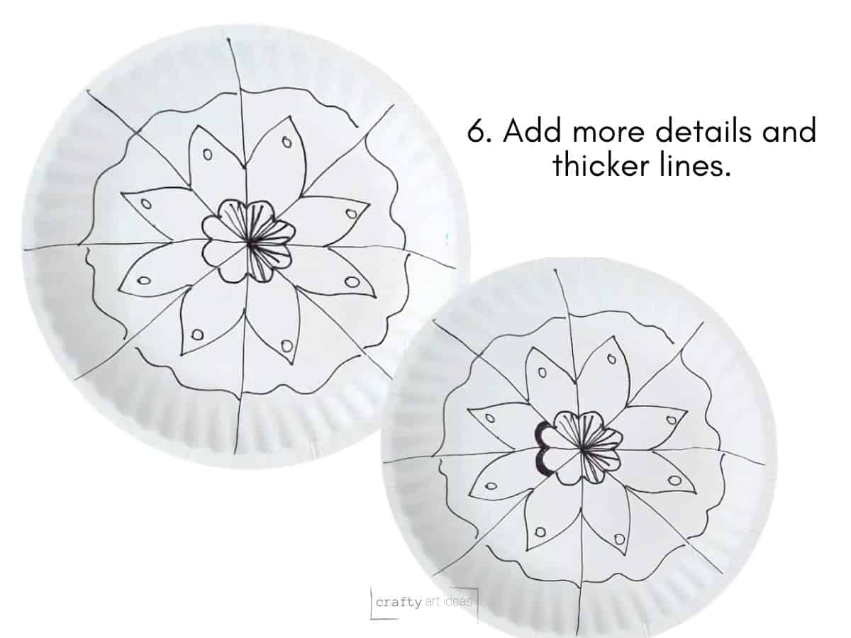 two paper plates with black designs and details.