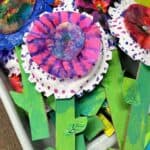 examples of paper flower craft with coffee filters and cardboard stems.