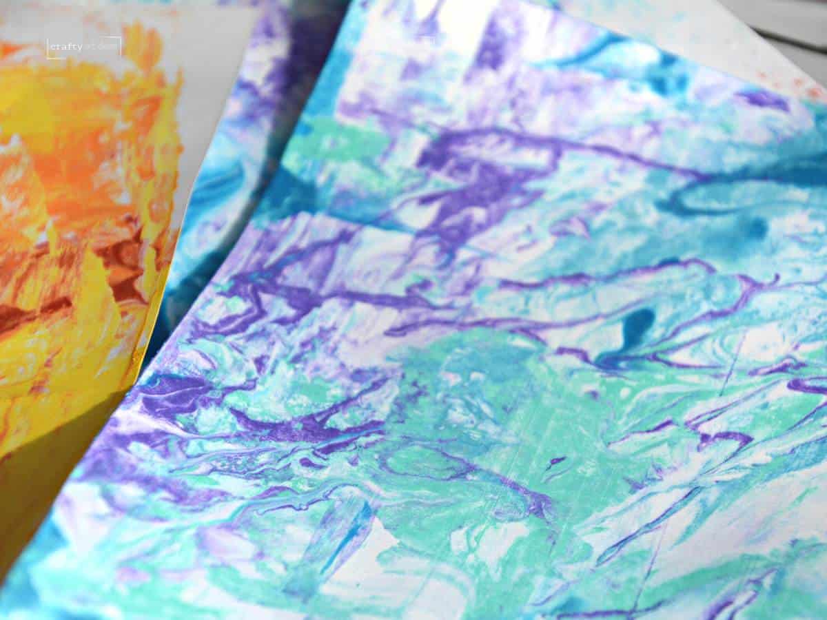 blue, green and purple shaving cream marbled paper.
