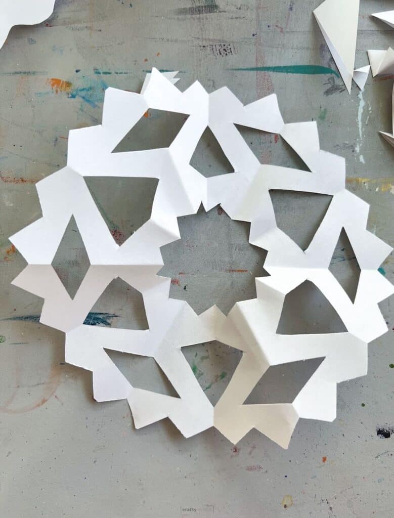 How To Make Paper Snowflakes In 5 Minutes (With Step-By-Step Pictures ...