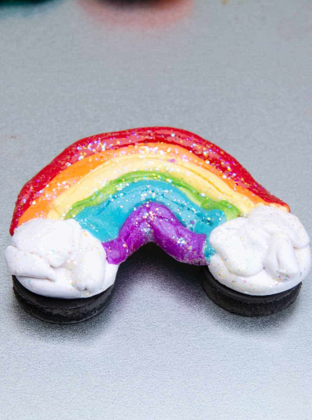 Rainbow clay magnet.