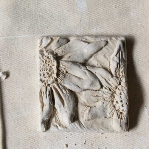 ceramic tile with flowers on it.