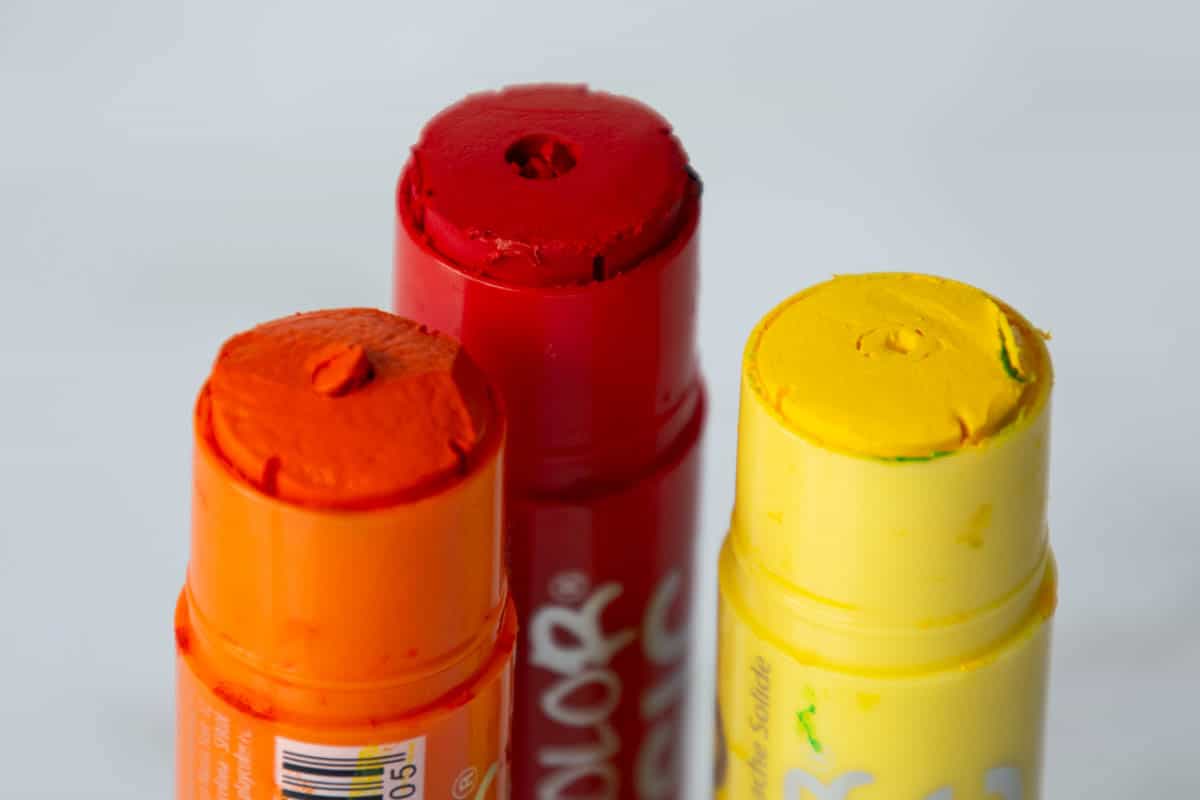 red, yellow and orange paint sticks.