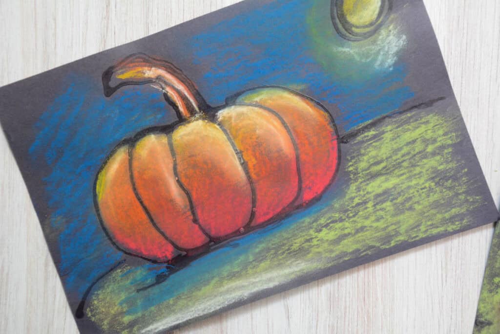 chalk pastel pumpkin drawing.