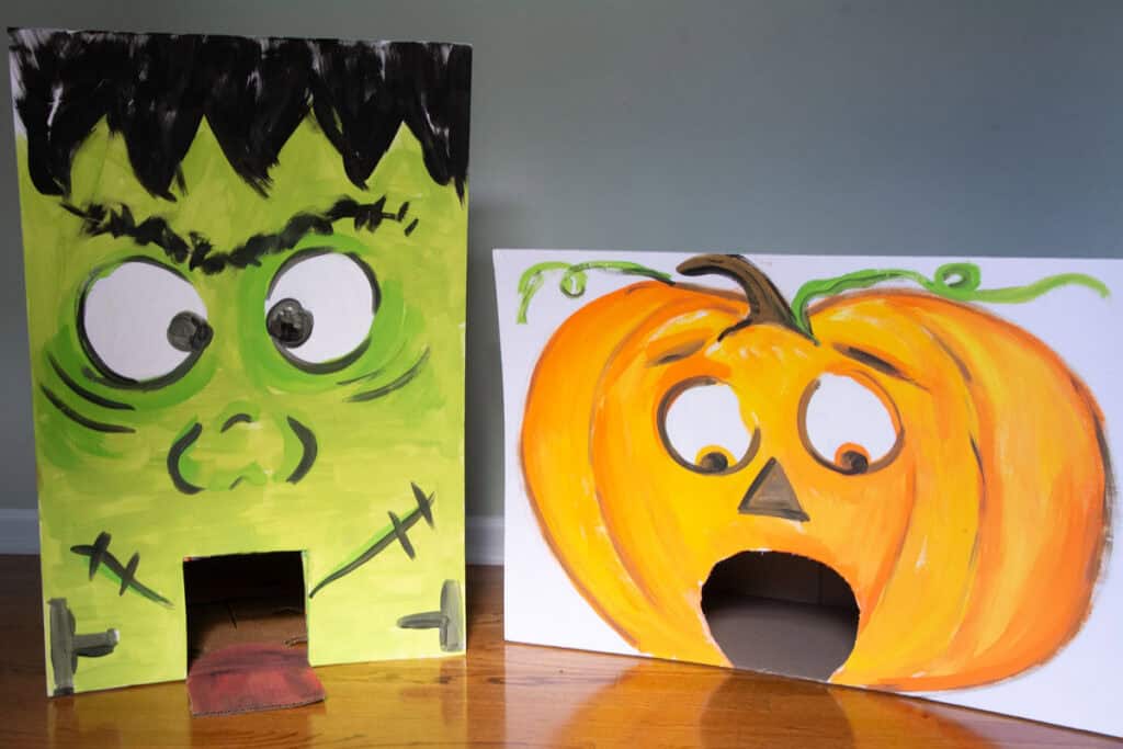 painted Frankenstein and pumpkin DIY Halloween golf game.