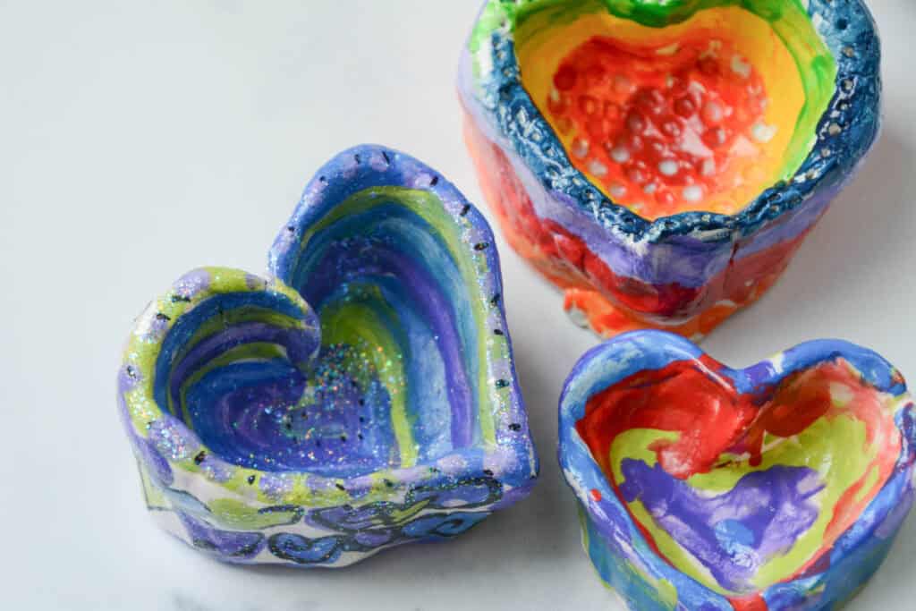 painted clay heart pinch pots.
