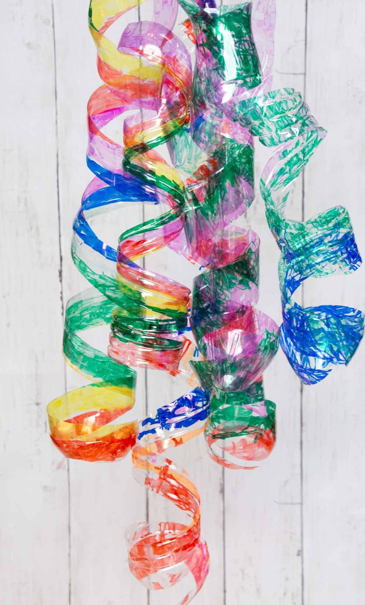 colorful twist bottle art hanging.