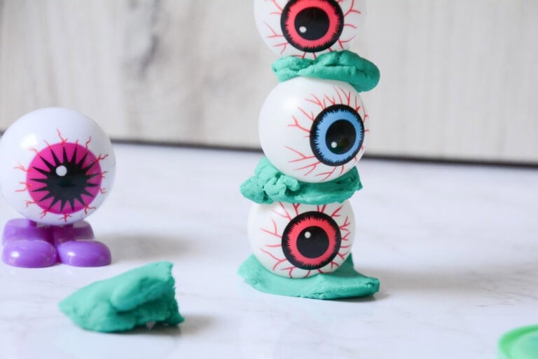 Colorful eyeball craft with clay and toy eyes for DIY art projects and creative activities.