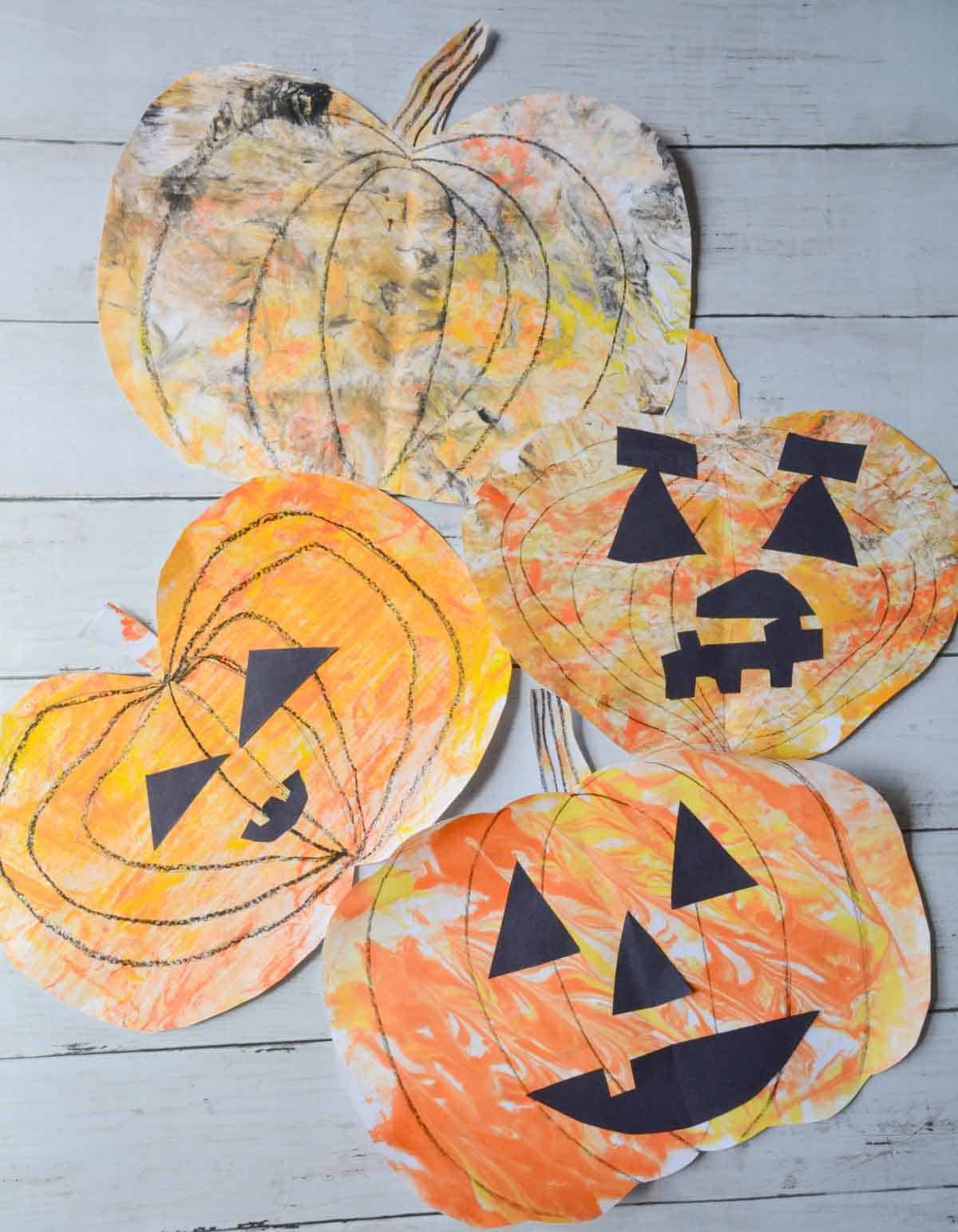 4 different shaving cream pumpkin Jack-o-latern art projects.