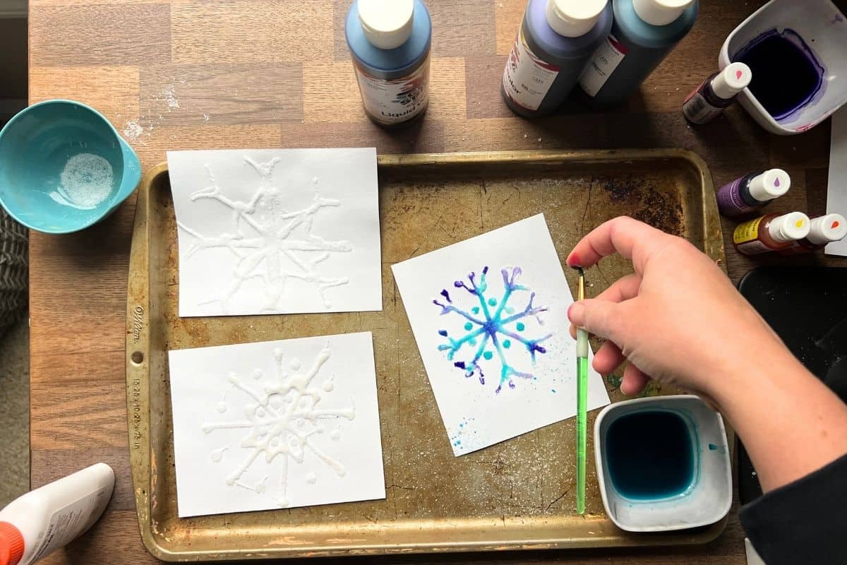 raised salt painting on white paper.