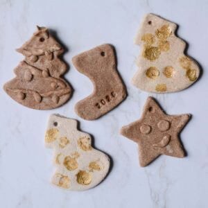 cinnamon salt dough ornaments on a table.