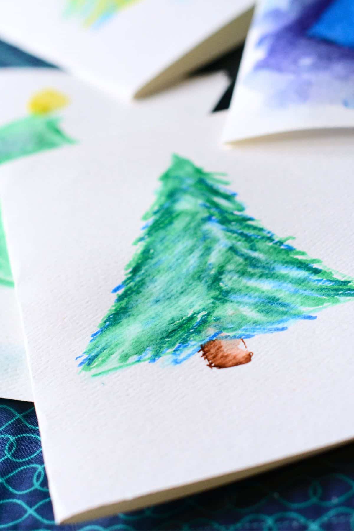Winter tree watercolor painting on card.