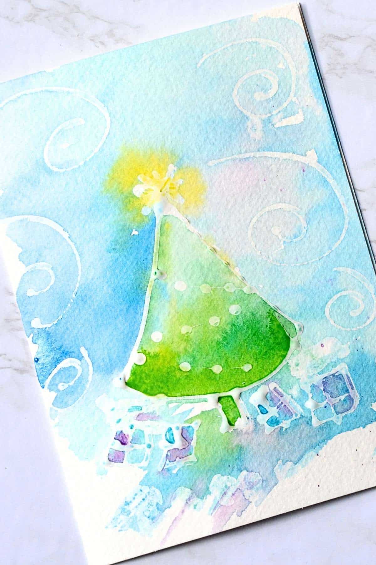 tree drawn in glue and painted with watercolor paint.