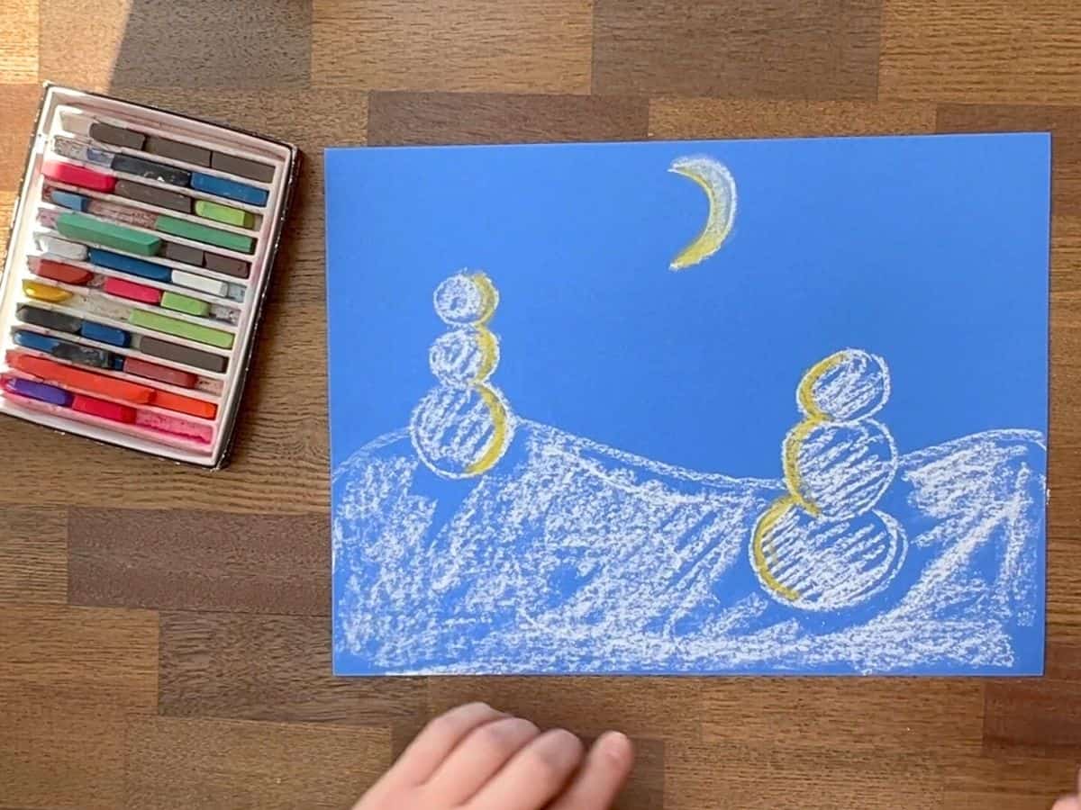 yellow chalk highlights added to snowman drawing.