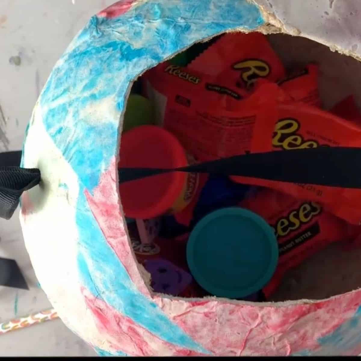 prizes inside a homemade balloon piñata.