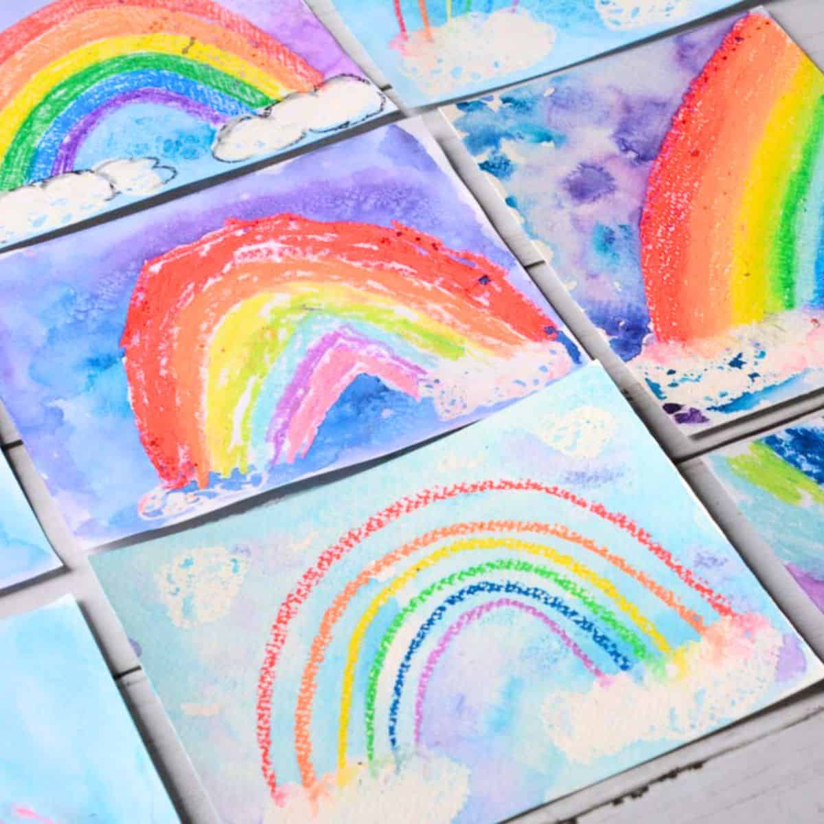 rainbow oil pastel and watercolor paintings made by kids.