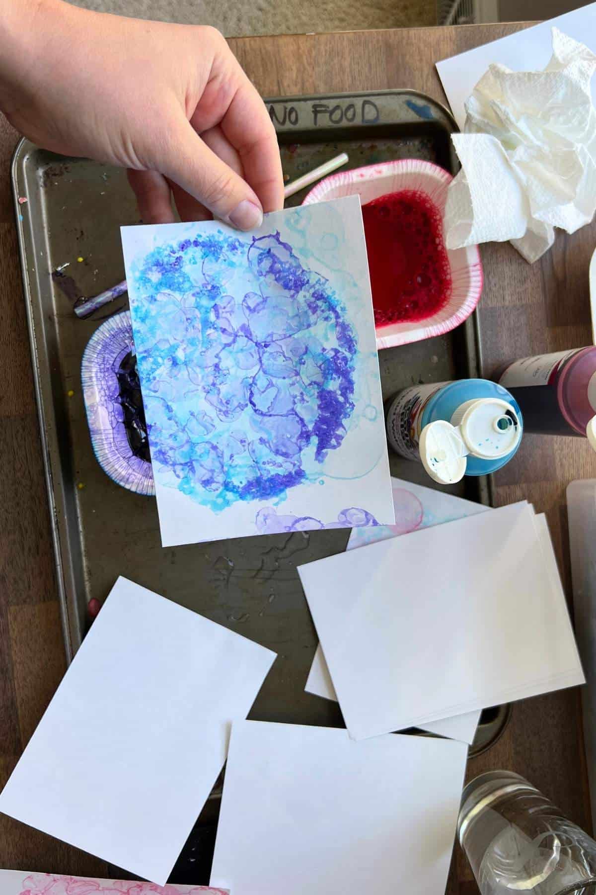 hand holding printed bubble paper.
