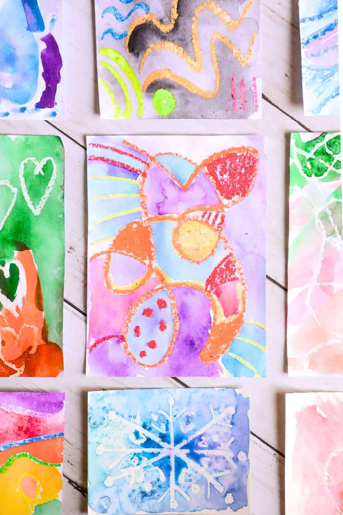 colorful abstract art with oil pastels and watercolor paint.