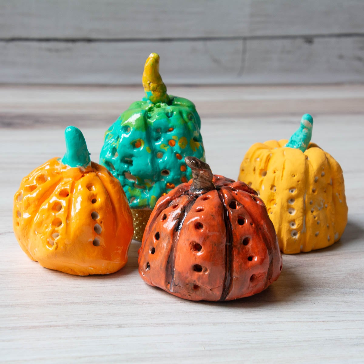 colorful polka dot clay pumpkins.