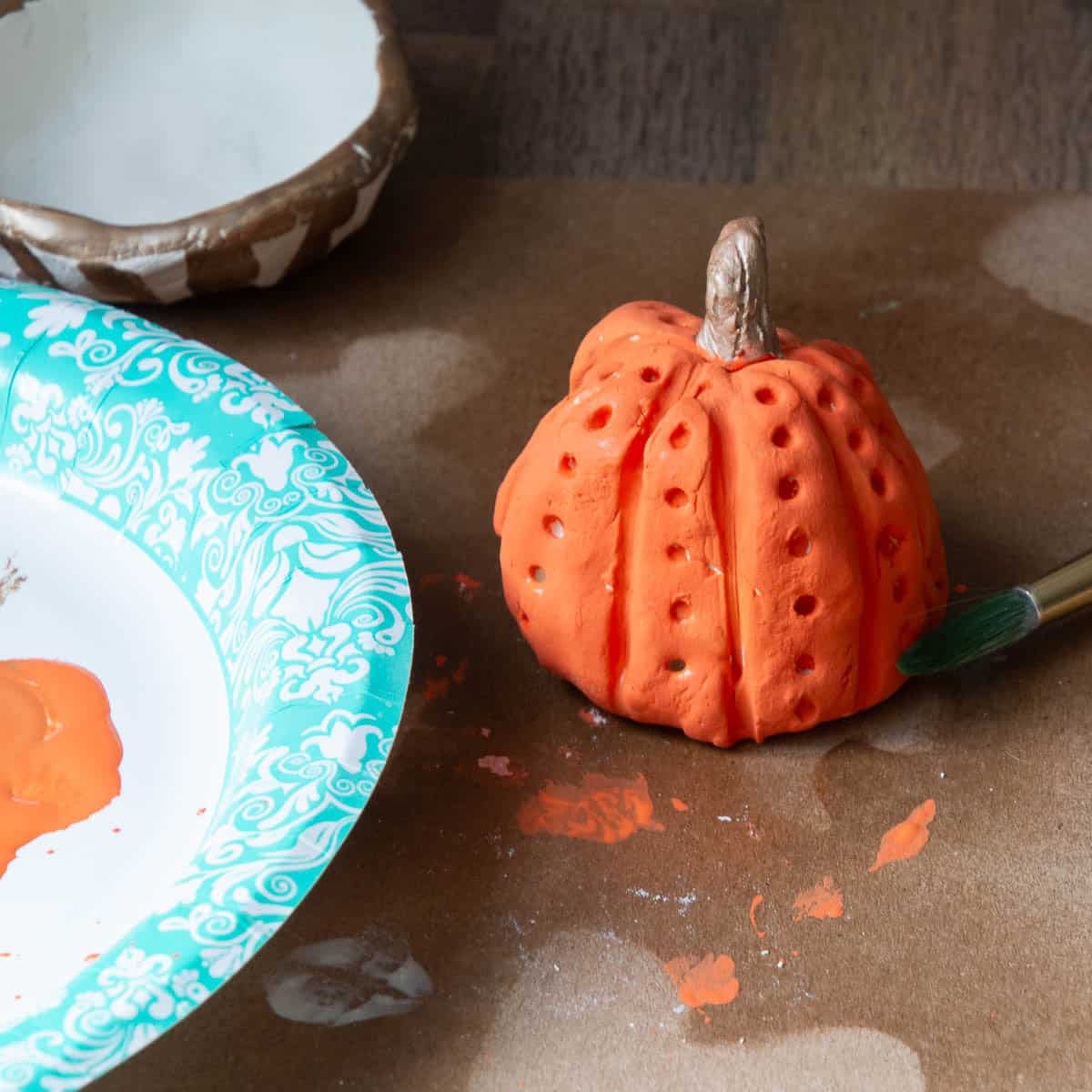 orange painted pumpkin.